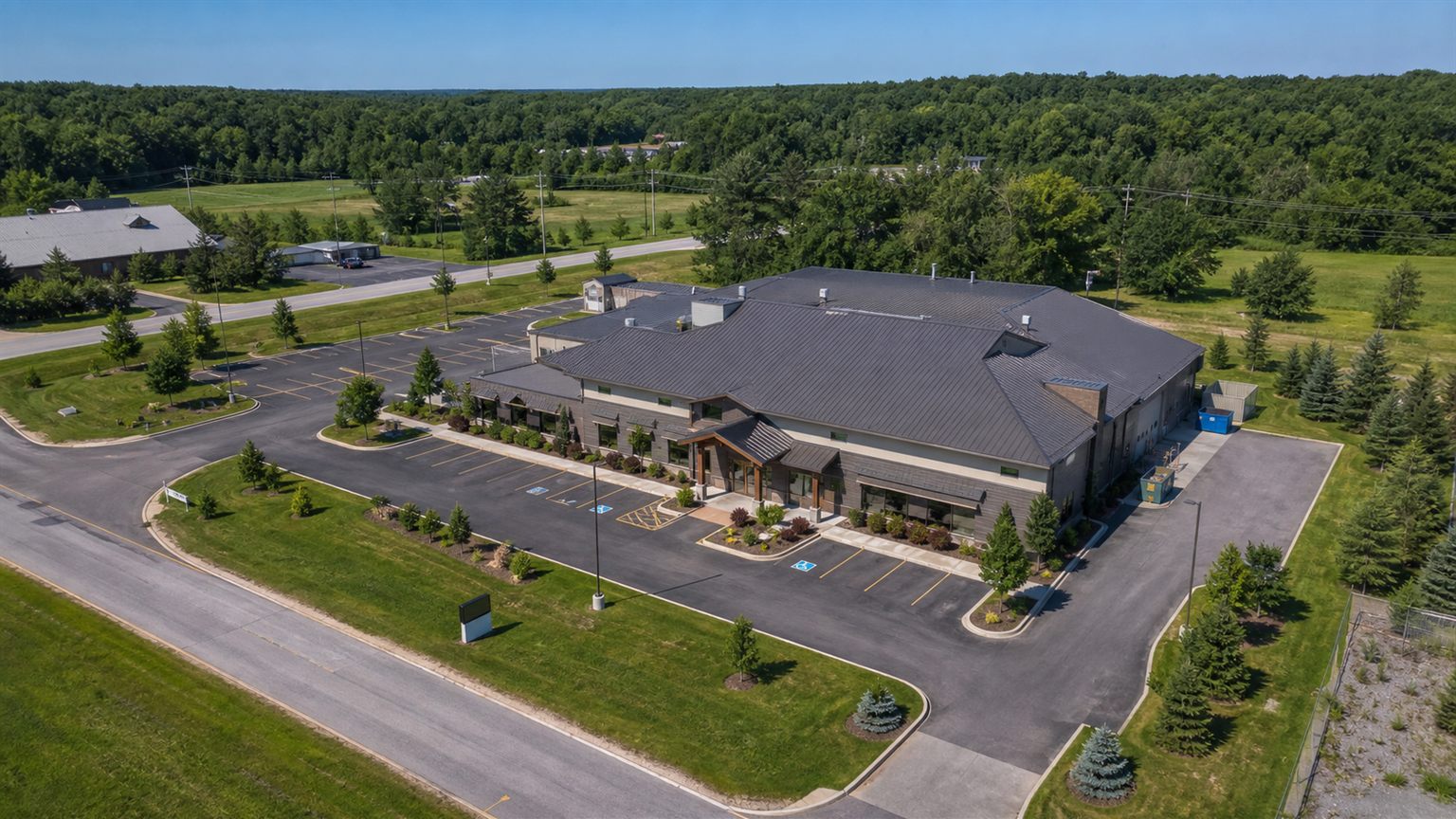 Aerial view of a business site and surrounding access