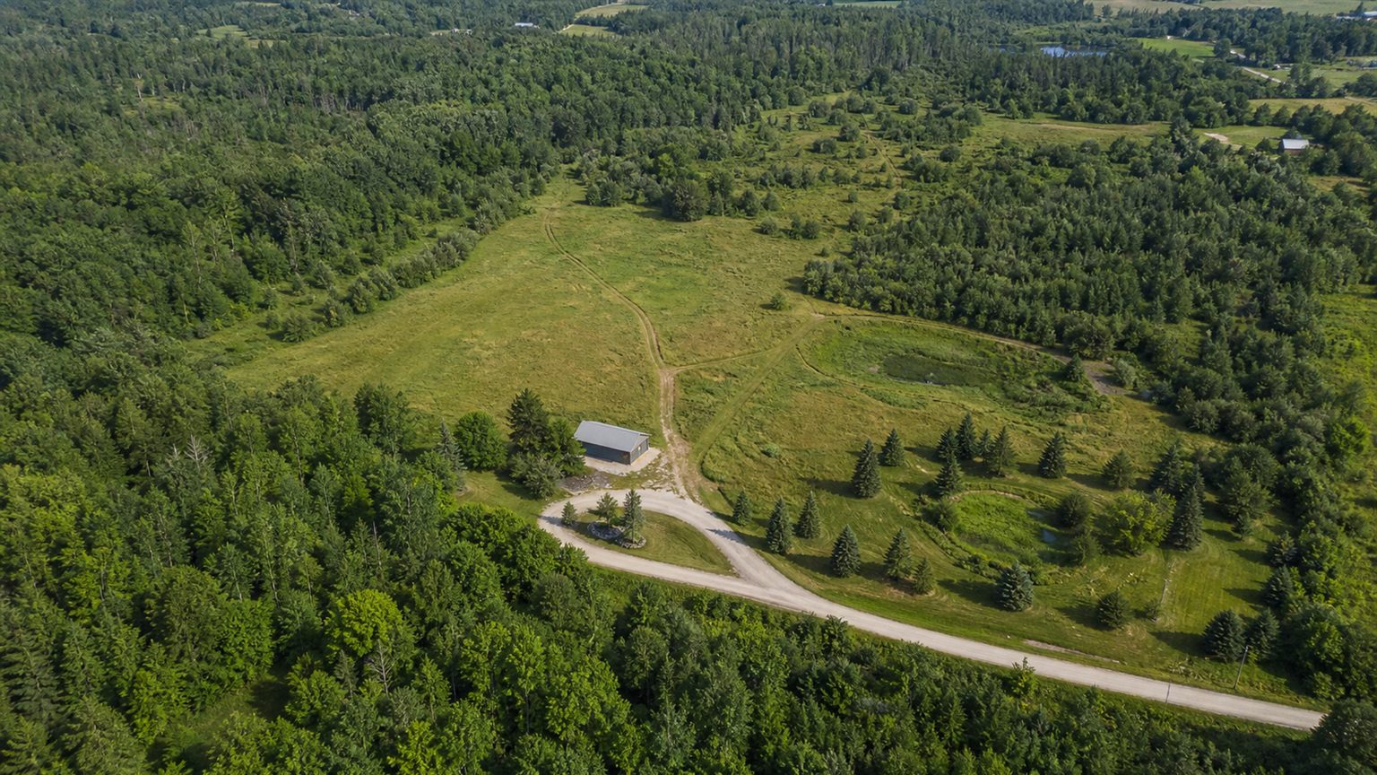 Aerial view of rural land and site features